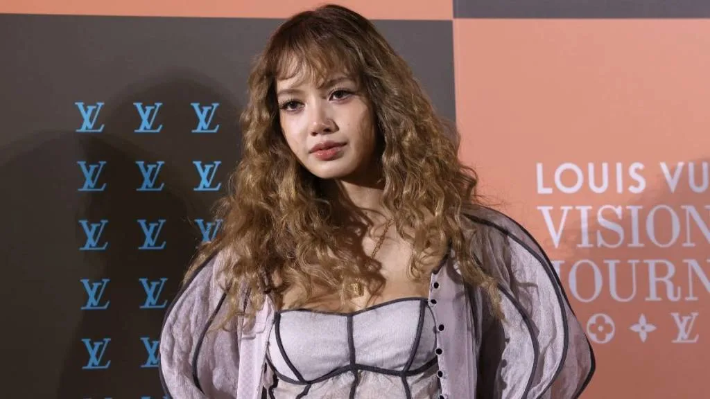 LISA of BLACKPINK in a Kith Women Spring 2026 Hera lambskin leather coat with modular convertible paneling.