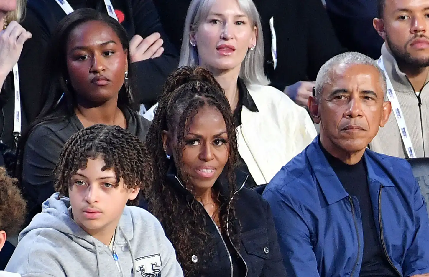 Barack and Michelle Obama sit courtside with daughter Sasha at the 2026 NBA All-Star Game in the Intuit Dome.